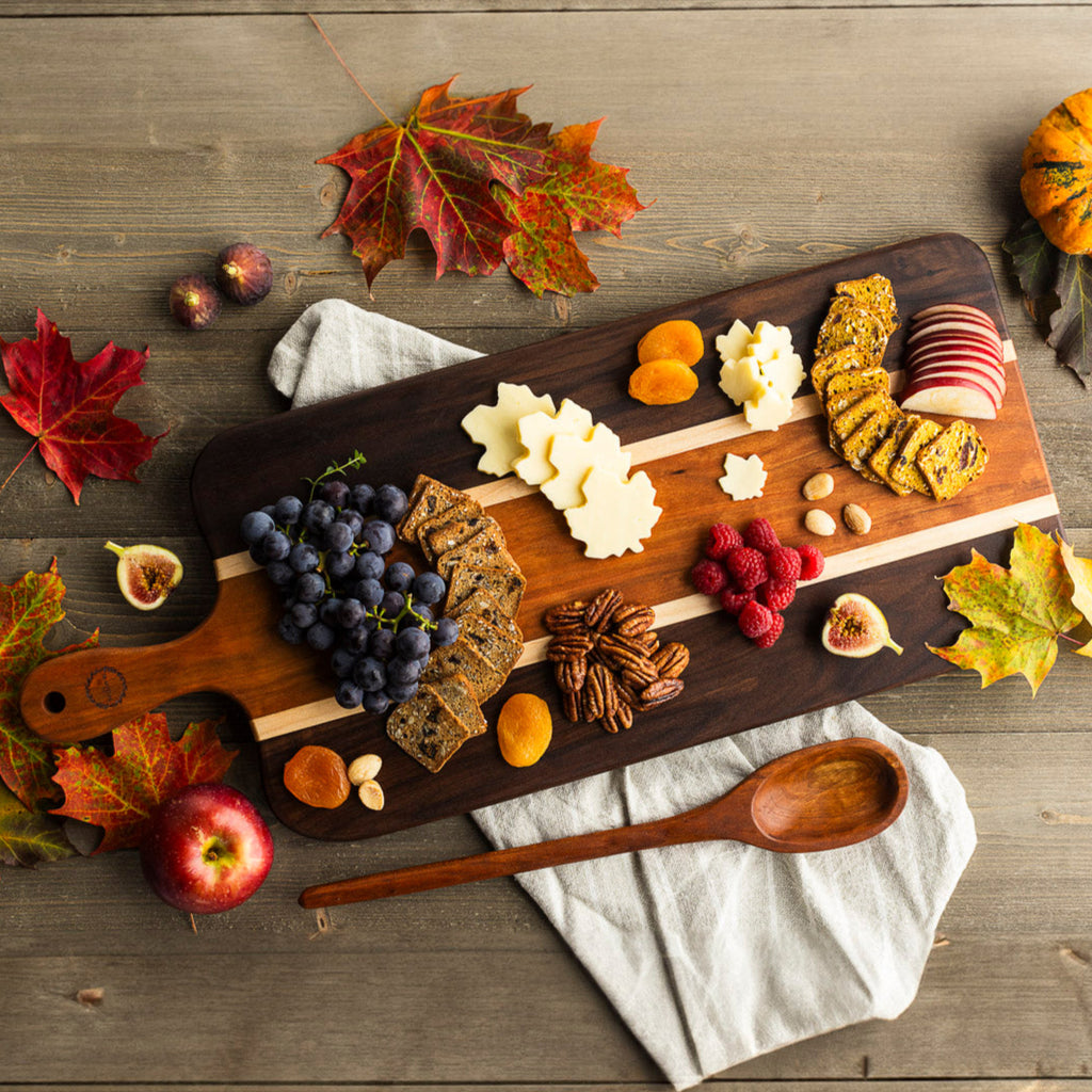 Beautiful, fall charcuterie display on handcrafted Vermont cherry and American walnut charcuterie board.