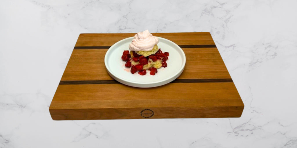 Fresh Vermont strawberry shortcake on a Willow Wood Cutting Board made of Vermont Cherry.