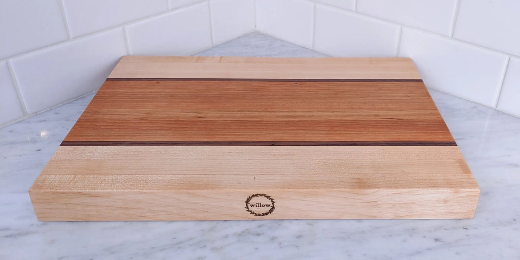 Custom Wooden Cutting Board | Handcrafted by Willow Nola on marble countertop